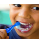 Illustration for article titled Keeping Your Childs Teeth Healthy